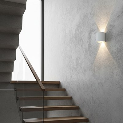 applique murale blanche cylindre dans escalier